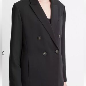 New VINCE black double-breasted crepe blazer. Never been worn. Tags on plastic